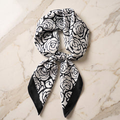 Silk Scarf Women 27x27 Head Scarf Neck Scarf Hair Wrap Bandana Luxury Scarves Womens – Black & Ivory Floral — Stylized Rose Blooms | Bracksley, knotted flat on marble