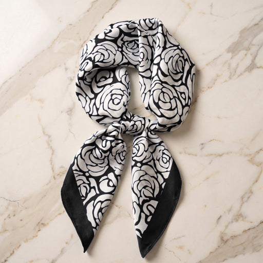 Silk Scarf Women 27x27 Head Scarf Neck Scarf Hair Wrap Bandana Luxury Scarves Womens – Black & Ivory Floral — Stylized Rose Blooms | Bracksley, knotted flat on marble
