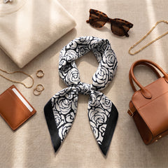 Silk Scarf Women 27x27 Head Scarf Neck Scarf Hair Wrap Bandana Luxury Scarves Womens – Black & Ivory Floral — Stylized Rose Blooms | Bracksley, flat lay with leather bag and sunglasses